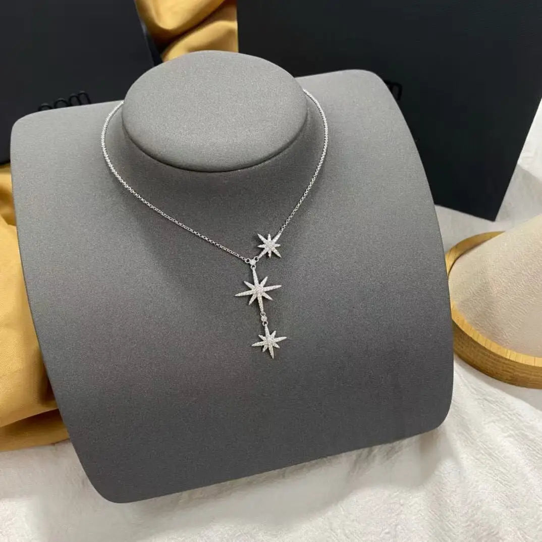 StellarGleam – Naszyjnik inspirowany spadającymi gwiazdami, srebro 925.